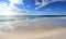 Beach with cloud reflections