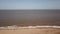 Beach ,coast line England ,off shore green wind power , windfarm ,green energy drone shot airal