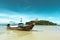 The beach with coconut trees and fishing boat.The Islands Of Thailand.