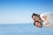 Beach couple laughing in love romance on travel honeymoon vacation