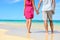 Beach couple in love holding hands on honeymoon