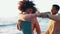 Beach, dancing and couple with love, vacation and adventure with marriage, relationship or romance. Anniversary, man and