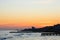 Beach at dawn, piers perspective view