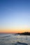 Beach at dawn, piers perspective view