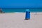 Beach day in summer with sun and sand with bathers on vacation at the edge of the beach