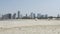 Beach in Dubai on the shore of the bay. United Arab Emirates. in the background is the construction of a new ultramodern area.