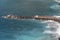 Beach, end of swimming season in Sorrento. Concrete blocks used as sea defense in Italy