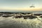 Beach in evening, after sunset during low tide showing sand form