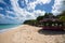 Beach fale`s on a white sand beach at Lalomanu, Samoa