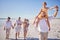 Beach, family and father with daughter on back and grandparents walk on sand to relax, bonding and fun. Happy, parents