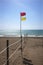 Beach fence and safe bathing flag