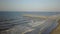 Beach fishing pier coast coastal North Carolina holden waves walking on beach