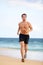 Beach fitness man runner running training cardio