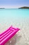 Beach floating lounge pink tropical sea Formentera