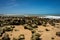 Beach full of rocks. Edge of the sea with rounded stones