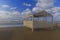 Beach gazebo overlooking the stormy sea