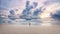 On the beach girl in swimsuit goes into the ocean large clouds away the rain