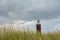 Beach grass with lighthouse Westhoofd in Ouddorp  with many copy space