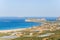 The beach by the greenhouses and olive trees in the countryside , in Europe, in Greece, in Crete, towards Kissamos, towards Chania