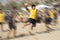 Beach handball player jumping with ball