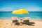 Beach holiday lounging chairs under sun umbrella vacation background. Summer tropical travel