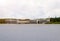 Beach with hotel buildings.