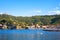 Beach hotels in Collioure village with a windmill at the top of the hill, Roussillon, Vermilion