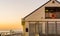 Beach house on the jetty of Blankenberge, Belgium, Architecture of the Belgian coast during sunset