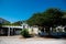 Beach houses with white picket fence and pergola along scenic 30A country road in Santa Rosa, South Walton Beaches near Destin and