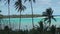 Beach Hut Bungalows In Blue Water Lagoon. Beach Resort On Cook Islands & Palm Trees