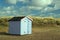 Beach hut in the sand dunes.