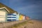 Beach huts along side Cromer beach.