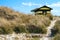 Beach huts or bath cottages on Skanor beach dunes and Falsterbo in South Sweden, Skane travel destination. Domestic tourism