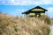 Beach huts or bath cottages on Skanor beach dunes and Falsterbo in South Sweden, Skane travel destination. Domestic tourism