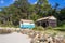 Beach huts, beach by Pambula river estuary