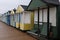 Beach huts coloured doors on wooden huts England