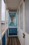 Beach huts coloured doors on wooden huts England