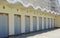 Beach huts under cliff near Brighton. Sussex. England