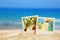 Beach with instant photos in front of summer sea background