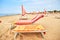 Beach in italy with parasols and sun lounges