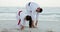 Beach, karate or stretching with father and daughter together outdoor for a self defense workout. Fitness, family or