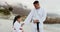 Beach, karate teacher or child learning martial arts, fighting or self defense for wellness or fitness. Man, master or
