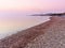 Beach at Kontari area, Chios island, Greece. Chimney of public electric power factory at the background