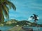 beach landscape San Juan del Sur Nicaragua with statue Jesus Christ on mountain