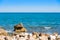 Beach landscape. Stone beach in Miami Platja, Tarragona, Catalunya, Spain. Copy space for text.