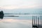 Beach landscape view with wooden foot bridge during sunset. Beatiful screnery of a beach with ocean and sky and water reflection