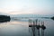 Beach landscape view with wooden foot bridge during sunset. Beatiful screnery of a beach with ocean and sky and water reflection