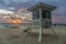 Beach lifeguard stand during beautiful sunrise