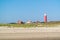 Beach and lighthouse De Cocksdorp, Texel, Netherlands