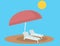 Beach lounge chairs and umbrella